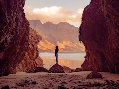 woman nurturing spirituality on beach